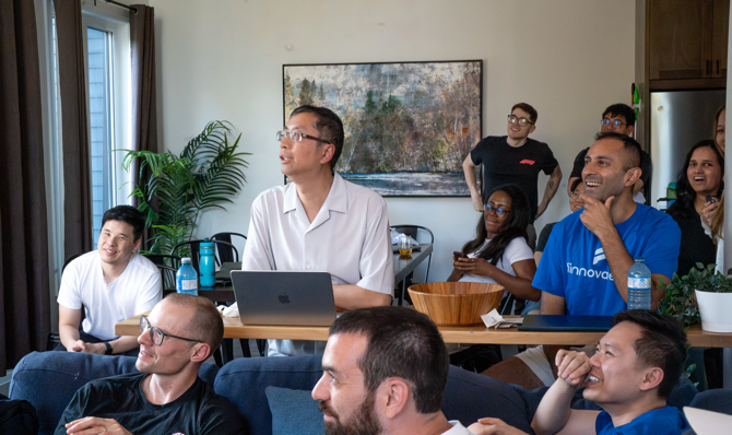The Finnovate team poses for a photo in a cottage during their hackathon team event