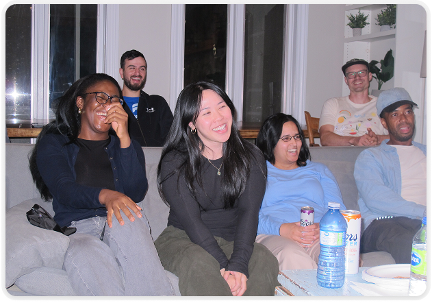 The Finnovate team outside in front of a lake in a ski village